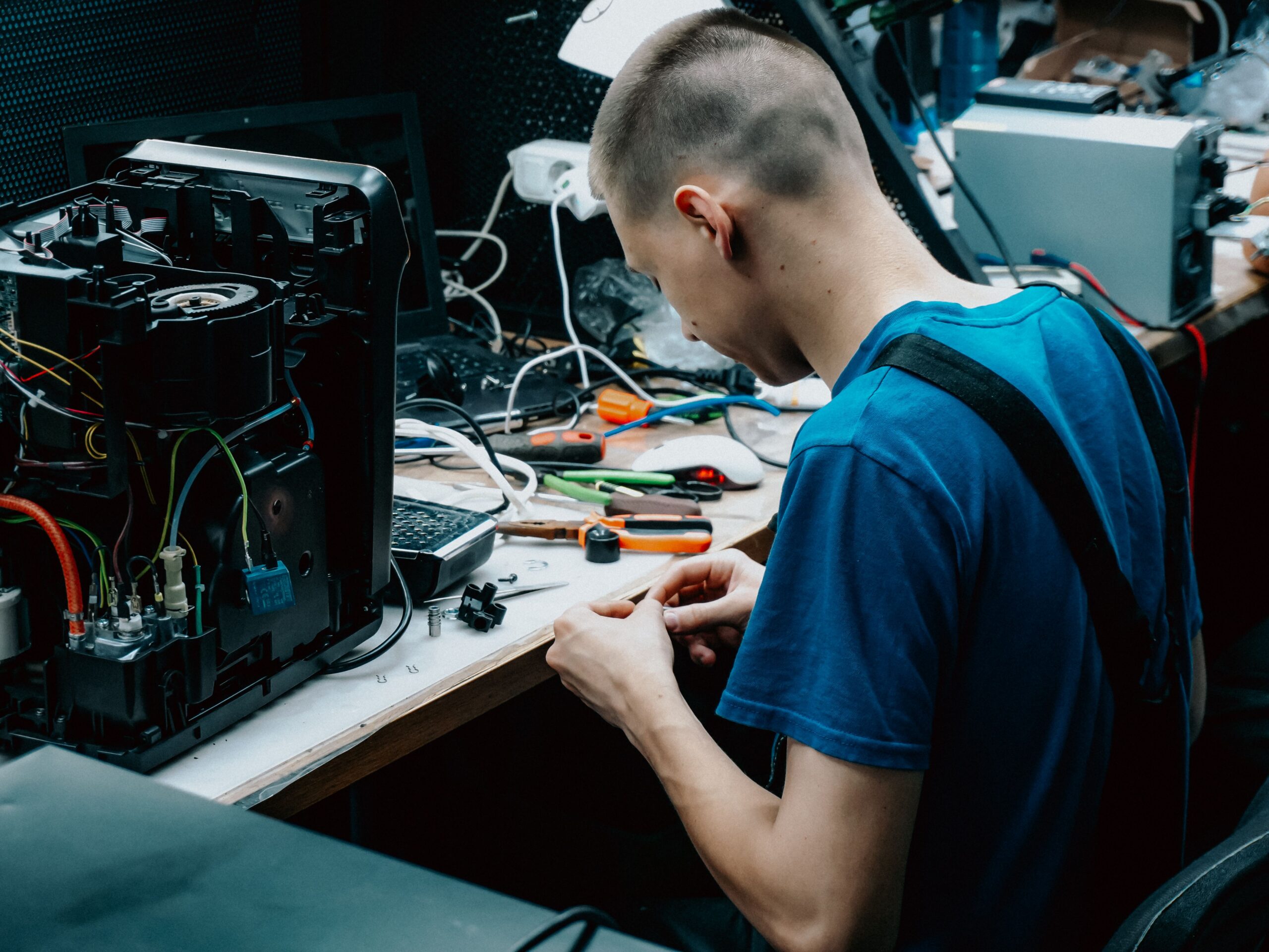 Technician repairing electronic devices